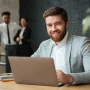 cheerful-young-caucasian-businessman cheerful-young-caucasian-businessman